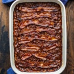 Baked beans in large baking dish.