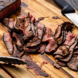 Sliced London Broil on cutting board.