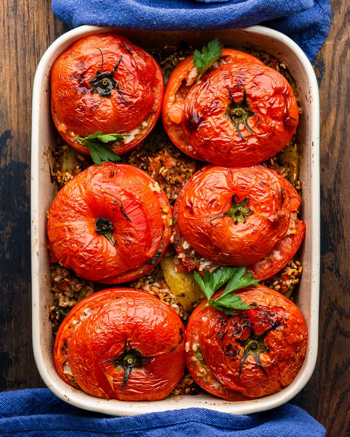 Roman stuffed tomatoes in baking dish.