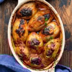 Greek stuffed onions in small baking dish.