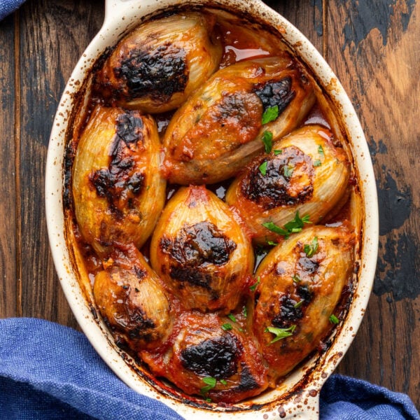 Greek stuffed onions in small baking dish.