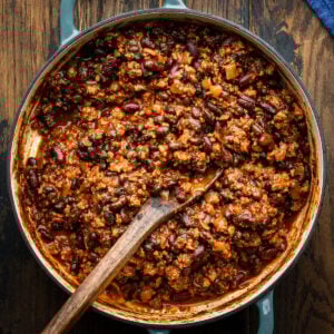 Turkey chili in large blue braiser pot.