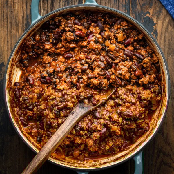 Turkey chili in large blue braiser pot.