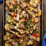 Sticky ribs with crispy potatoes in large sheet pan.