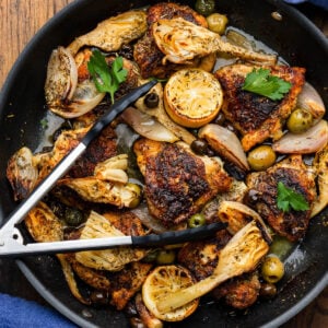 Chicken Provencal in large black pan.
