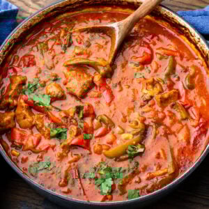 Veal and peppers in large braiser.