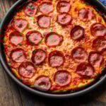 Bar pizza in on wooden table.