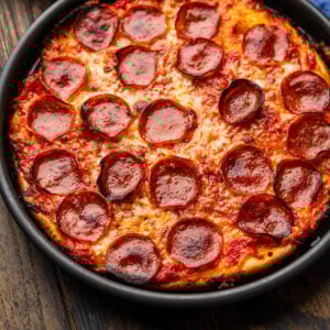 Bar pizza in on wooden table.