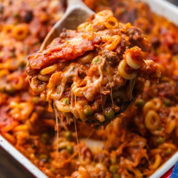 Spoon grabbing large section of anelletti al forno.