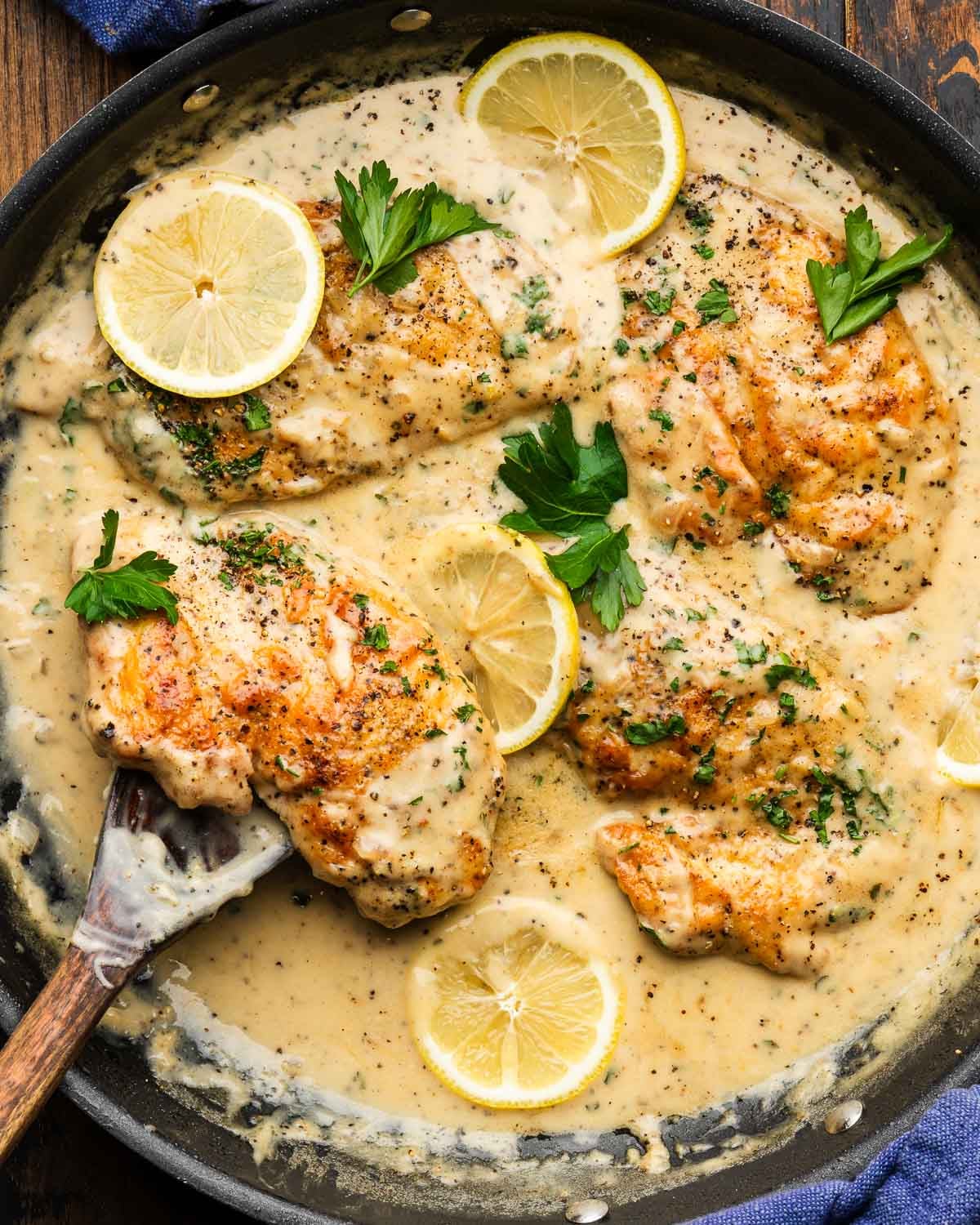 Large pan with creamy lemon pepper chicken.
