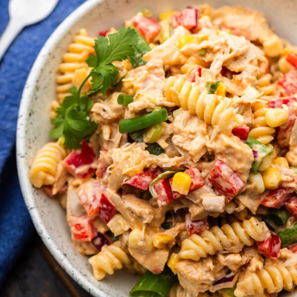 Barbecue chicken pasta salad in white bowl.