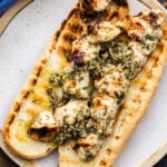Chicken spiedies on grilled hoagie.