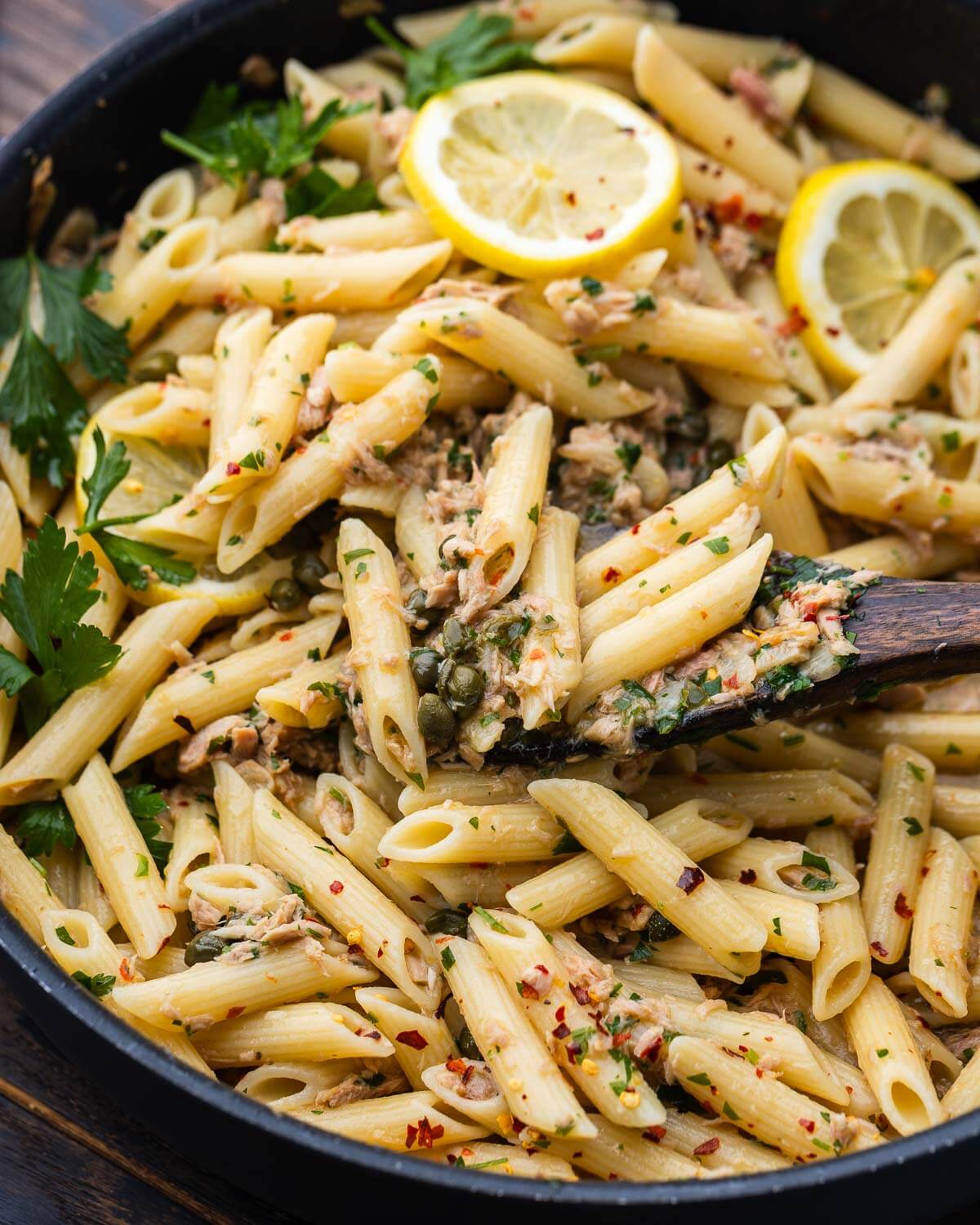 Tuna pasta in large black pan.