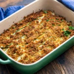 Zucchini potato al forno on wooden table.