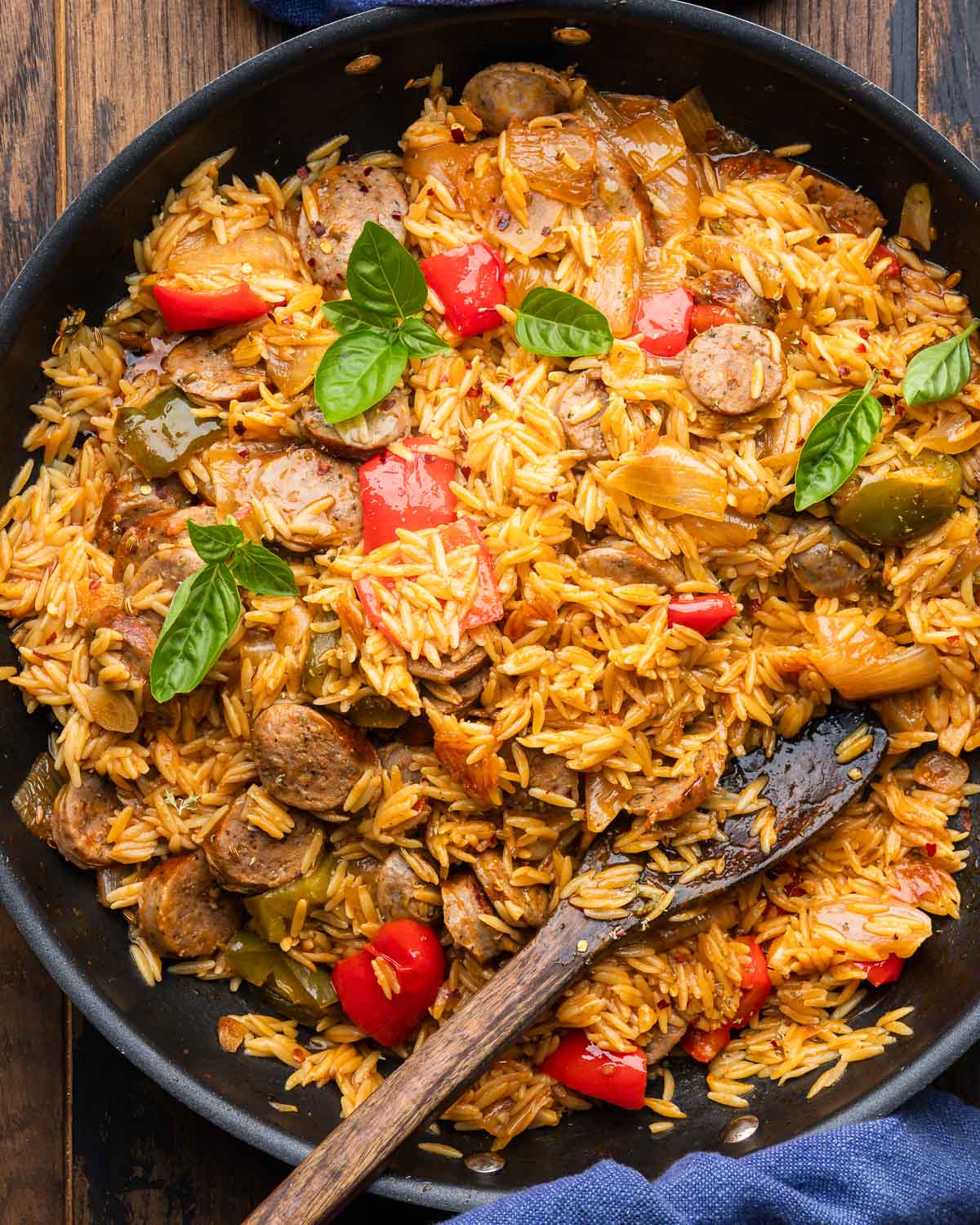 Large black with sausage and peppers with orzo.