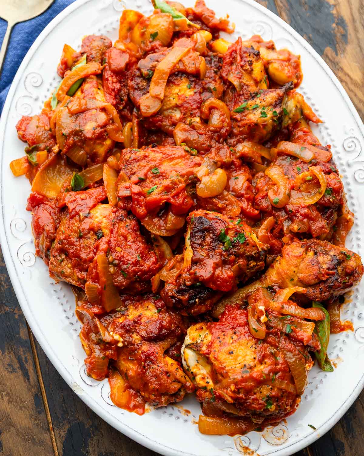 White platter with pollo alla potentina.